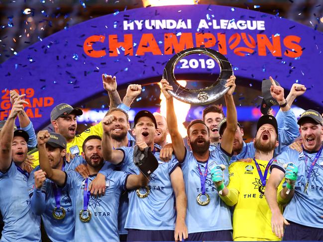 PERTH, AUSTRALIA - MAY 19: Alex Brosque of Sydney FC and team mates celebrate winning the 2019 A-League Grand Final match between the Perth Glory and Sydney FC at Optus Stadium on May 19, 2019 in Perth, Australia. (Photo by Cameron Spencer/Getty Images)