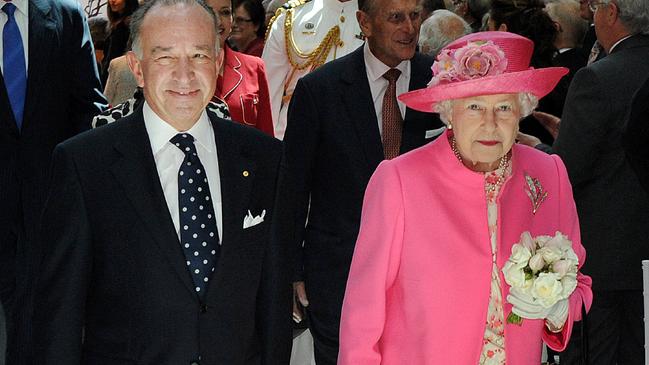 Tony Beddison walks out with Queen Elizabeth after the opening of RCH in Melbourne in 2011.