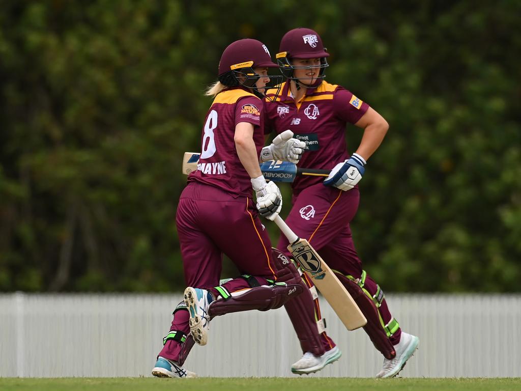 GOLD COAST, AUSTRALIA - OCTOBER 03: Georgia Redmayne and Georgia Voll of Queensland run between the wickets during the WNCL match between Queensland and the Australian Capital Territory at Bill Pippen Oval, on October 03, 2022, in Gold Coast, Australia. (Photo by Albert Perez/Getty Images)