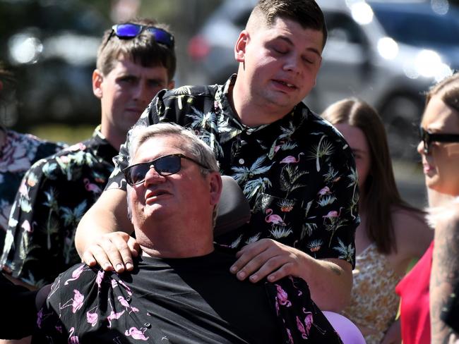 Lily’s father is comforted outside the church. Picture: BACKGRID via NCA NewsWire