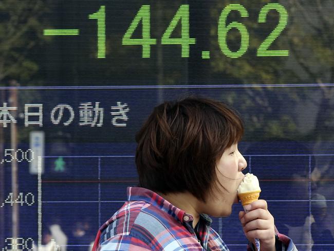 Shares fell in Japan and Australia on uncertainty over the potential impact of US President Donald Trump's travel ban. Picture: AP Photo/Koji Sasahara