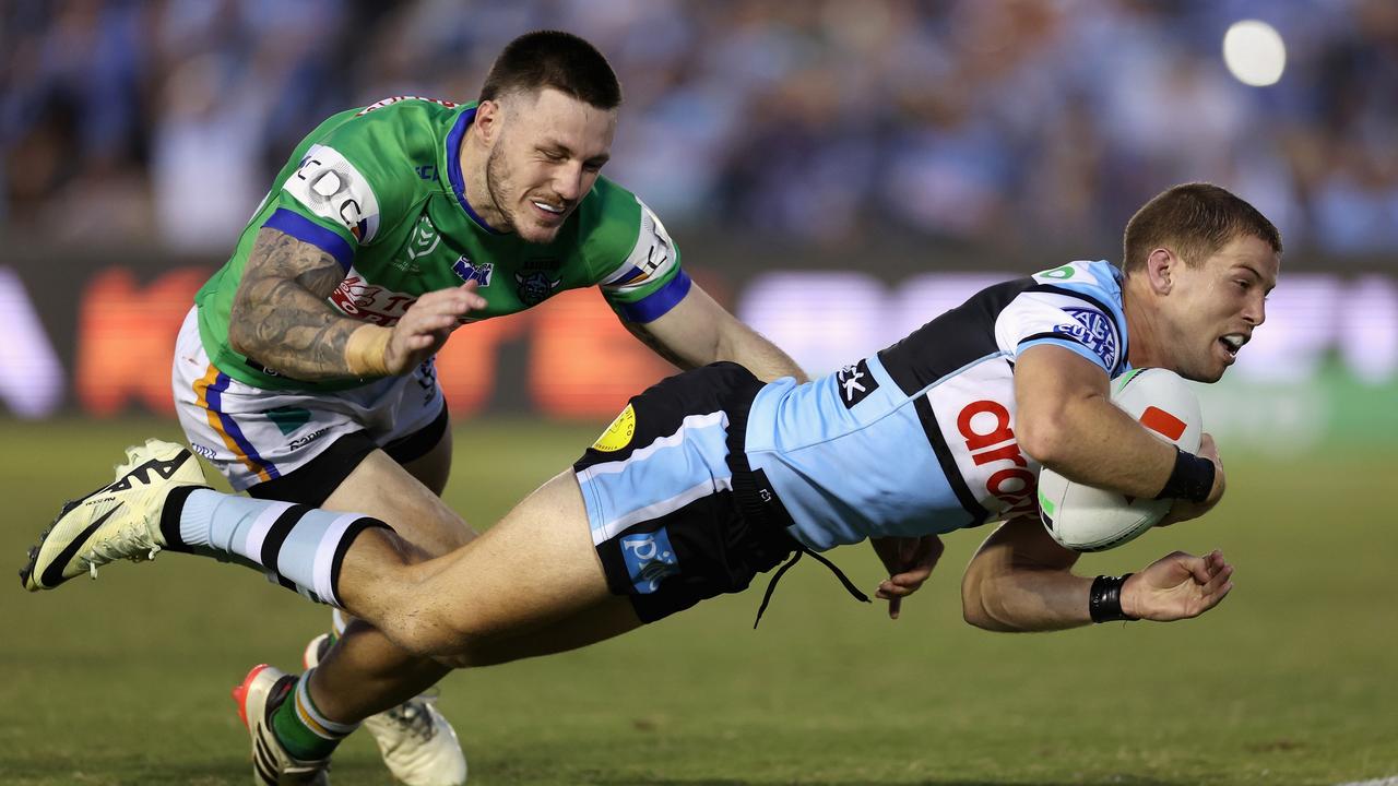 SYDNEY, AUSTRALIA - MARCH 31: Blayke Brailey of the Sharks scores a try during the round four NRL match between Cronulla Sharks and Canberra Raiders at PointsBet Stadium, on March 31, 2024, in Sydney, Australia. (Photo by Cameron Spencer/Getty Images)