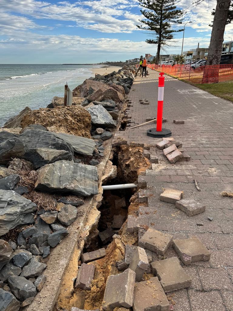 About 220 lineal metres of the coast path was damaged, in particular the infrastructure under the paved footpaths and parts of the rockwall. Picture: City of Holdfast Bay