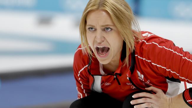 Denmark's skip Madeleine Dupont makes a call against Canada. Photo: AP