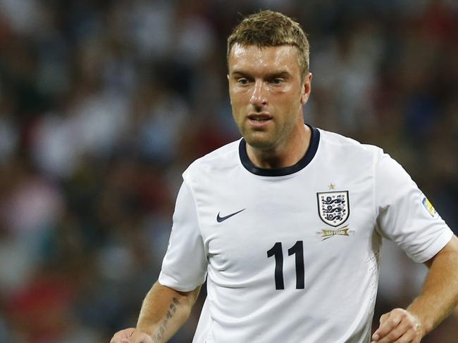 FILE - This is a Friday, Sept. 6, 2013 file photo of England Rickie Lambert as he plays against Moldova during the World Cup group H qualifier soccer match between England and Moldova at Wembley Stadium in London. England striker Rickie Lambert Monday June 2, 2014 joined Liverpool from Southampton for a reported fee of 4 million pounds ($6.7 million), strengthening the team’s attacking options ahead of its return to the Champions League. Released by his boyhood club as a 15-year-old, Lambert returns to Anfield after spending most of his career as a journeyman in England’s lower leagues before making his name with Southampton since 2009. (AP Photo/Sang Tan)