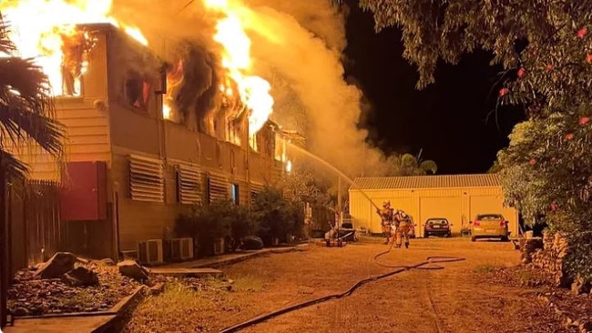 Firefighters work to put out a fire at Barnacles Backpackers Bowen. Photo: Supplied