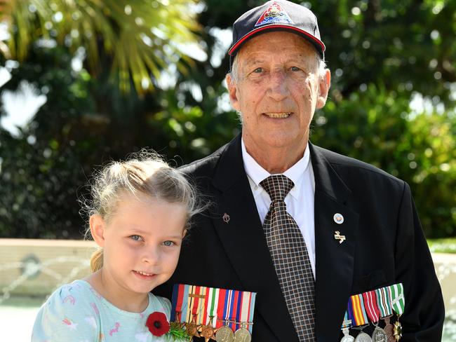 Anzac Day parade on the Strand in Townsville. Vietnam Veteran Bill Wight (correct) with granddaughter Olivia Wight, 6. Picture: Evan Morgan