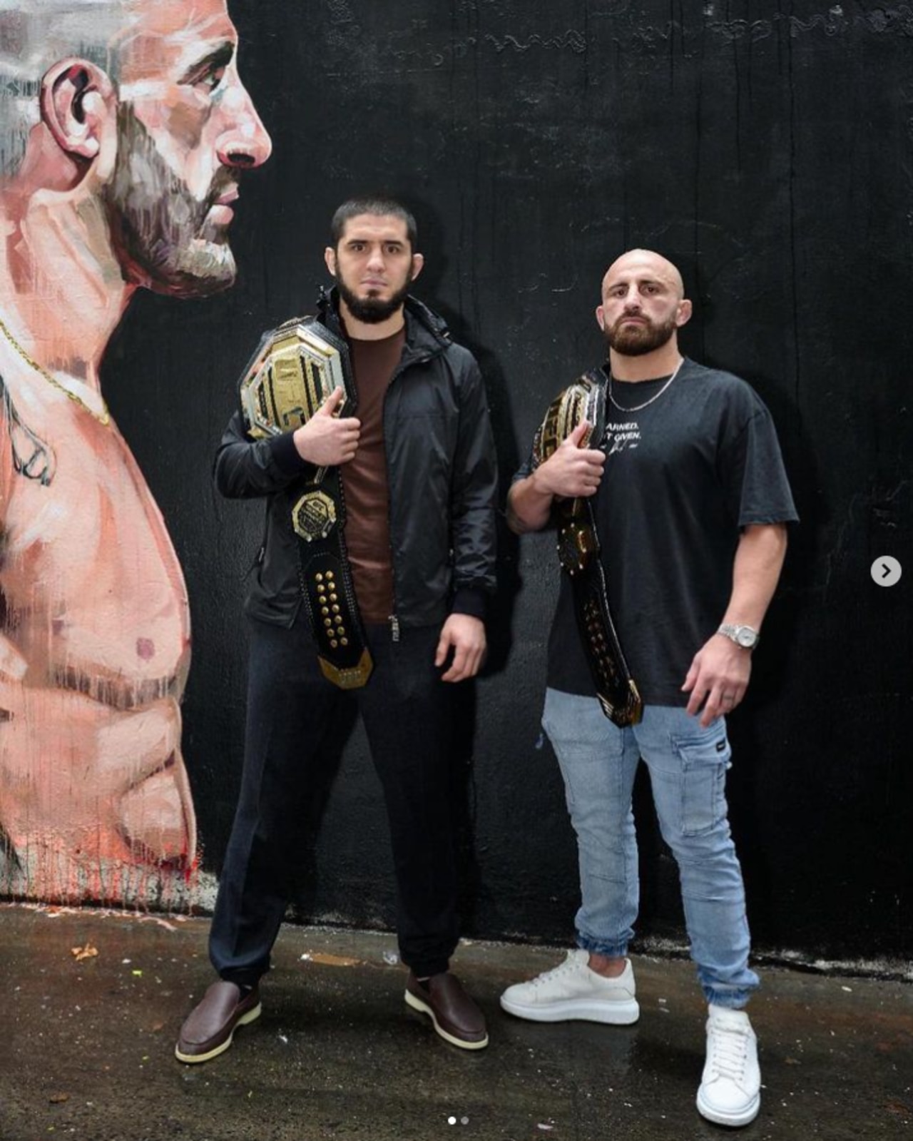 Islam Makhachev (L) and Alexander Volkanovski (R) face-off in Sydney ahead of their title fight at UFC 284 in Perth. (Photo via Islam Makhachev/Instagram)