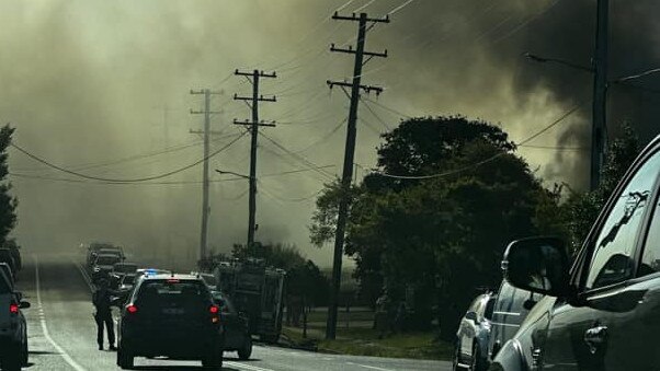 Harrowing scenes show smoke plumes billowing from the house on Bray St, Coffs Harbour. Picture: Jasmine Lee Brady