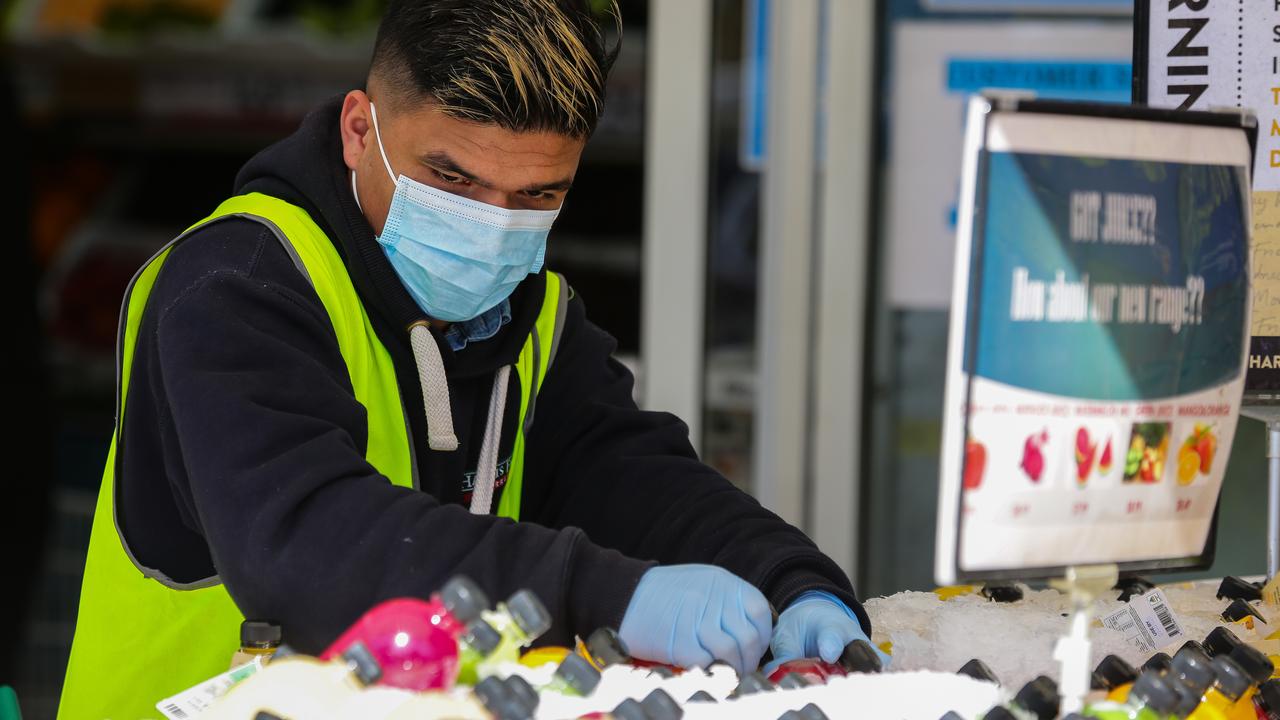 A staff member at Harris Farms in Manly wearing a mask. Harris farm management sent out an email to all customers to wear face masks when shopping at the stores. Picture: Gaye Gera/NCA/NewsWire