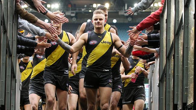 Brandon Ellis leading the Tigers off the MCG. Picture: Michael Klein