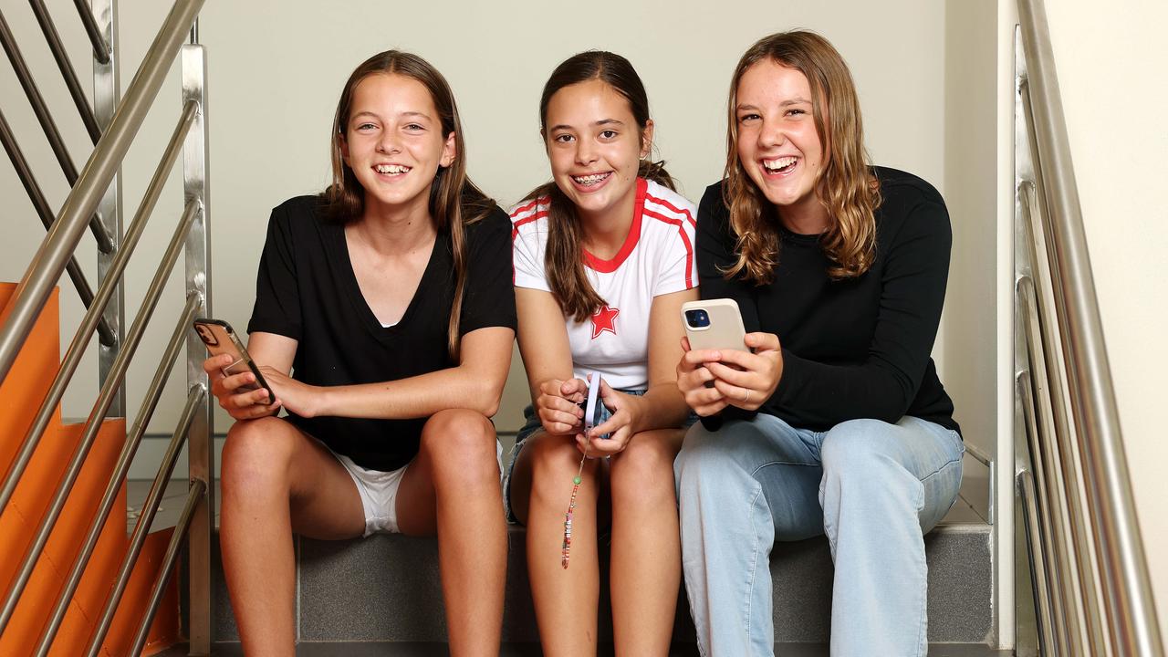 Teenagers (from left) Frankie Gibson, Maeya Cassim and Hazel Easter say it’s easy to get stuck scrolling on social media. Picture: Tim Hunter