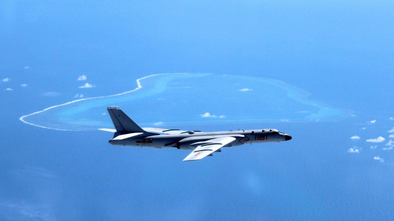 China’s state media uploaded a video of Chinese bombers conducting take-off and landing training on an island in the South China Sea.