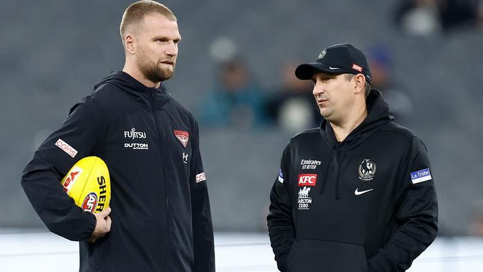 MELBOURNE, AUSTRALIA - JULY 05: Jake Stringer of the Bombers and Hayden Skipworth chat during the 2024 AFL Round 17 match between the Collingwood Magpies and the Essendon Bombers at Melbourne Cricket Ground on July 05, 2024 in Melbourne, Australia. (Photo by Michael Willson/AFL Photos via Getty Images)