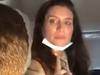 Woman slaps passenger in flight tirade