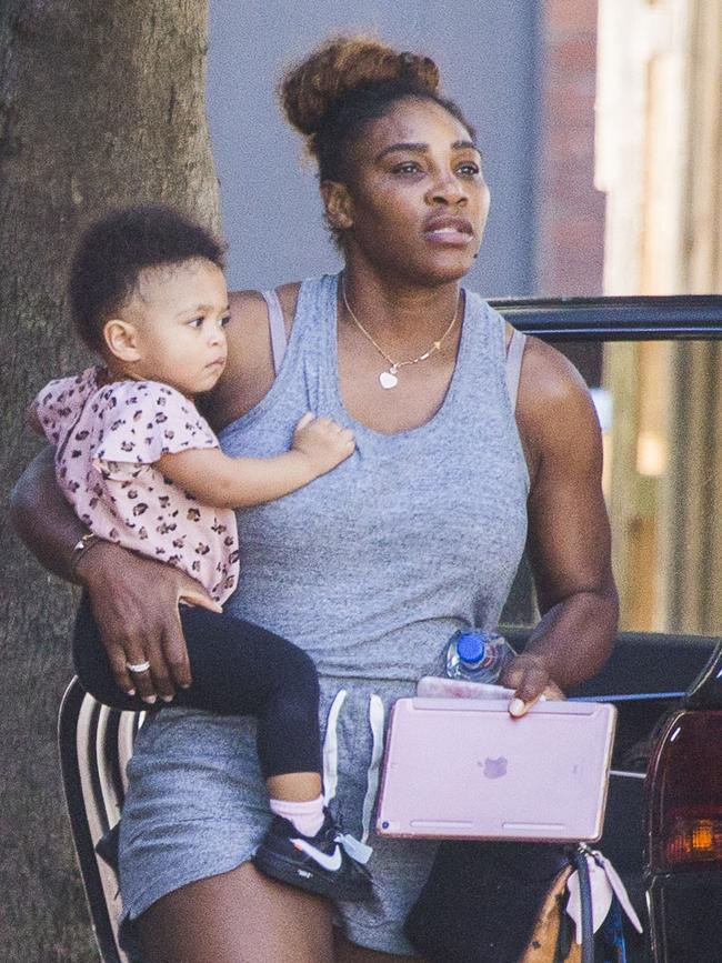 Serena Williams and her husband Alexis Ohanian enjoy an afternoon walk with their 1-year-old daughter Alexia Olympia. Serena's daughter looked seriously cute, toddling her way down the footpath, wearing Nike sneakers like her Mummy. Picture: MediaMode