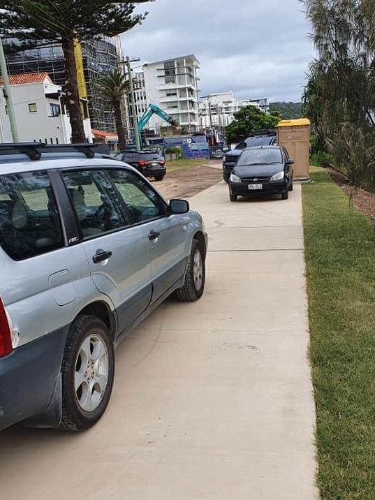 Cars parked along Palm Beach footpaths, while a portable toilet also blocks the walkway. Picture: supplied