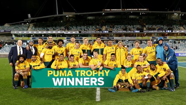 The Wallabies pose for a group photo after winning the Puma Trophy at Canberra Stadium.