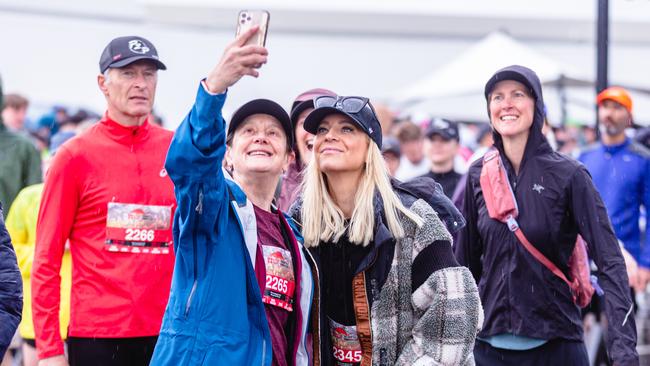 Fans take selfies with Carrie Bickmore at the start of the point to pinnacle.Picture: Linda Higginson