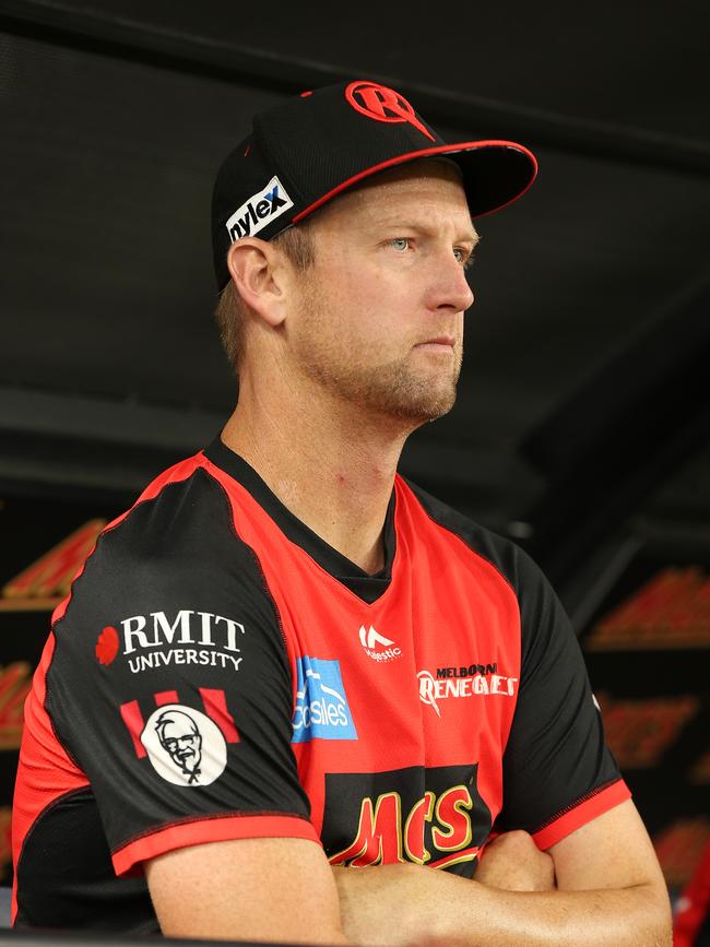 Cameron White of the Renegades looks on from the bench after retiring hurt. Picture: Getty Images