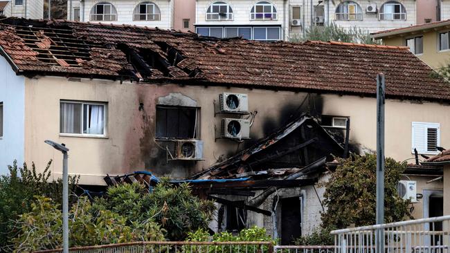 A picture shows a house damaged in a rocket attack in the northern region of Kiryat Shmona near the border with Lebanon amid increasing cross-border tensions.