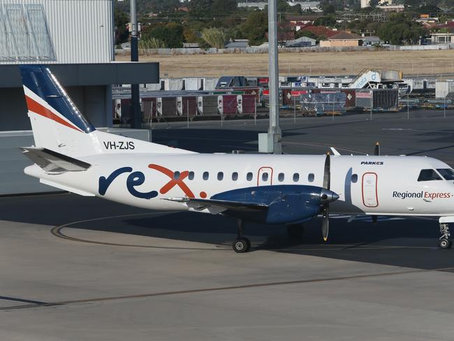 REX airline aeroplanes, planes, crew, refuelling and catering seen from Gate 10 of the Adelaide Airport. Regional Express is an Australian airline based in Mascot, New South Wales. It operates scheduled regional services. (AAP/Emma Brasier)