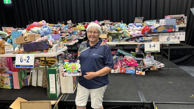 Volunteer Kay Fitzpatrick preparing for St Vincent de Paul Society NT's annual hamper project.