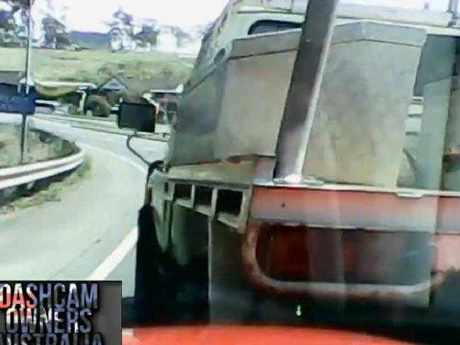 Video still from Dash Cam Owners Australia Facebook page of a ute who aggressively cuts off a driver on the pacific highway, right outside the Big Banana. Picture: Dash Cam Owners Australia / Facebook