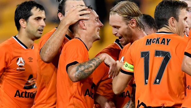 Brisbane Roar winger Eric Bautheac (centre) celebrates scoring against Wellington on Friday night. Picture: AAP 