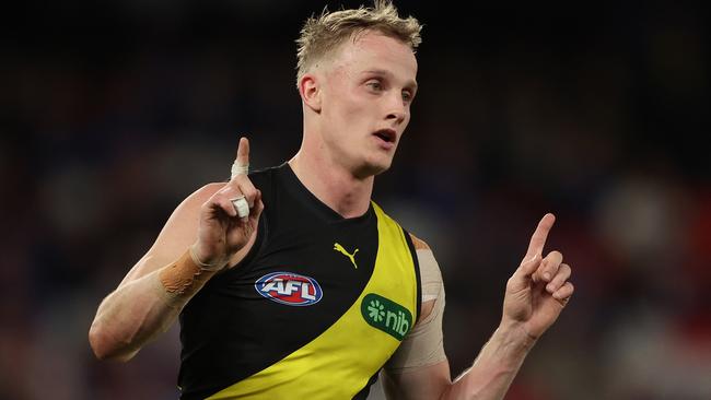 MELBOURNE, AUSTRALIA - AUGUST 04: Noah Cumberland of the Tigers celebrates after scoring a goal during the round 21 AFL match between Western Bulldogs and Richmond Tigers at Marvel Stadium, on August 04, 2023, in Melbourne, Australia. (Photo by Robert Cianflone/Getty Images)