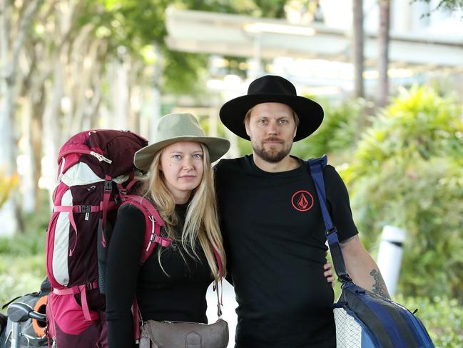 Viivi Thorvinen and Antti Lahtinen catching the last plane home before the borders are closed to Finland. Picture: Liam Kidston