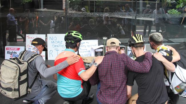 Delivery workers and the Transport Workers’ Union held a vigil outside Uber's Sydney office after the deaths of several delivery riders. Picture: NCA NewsWire/Gaye Gerard