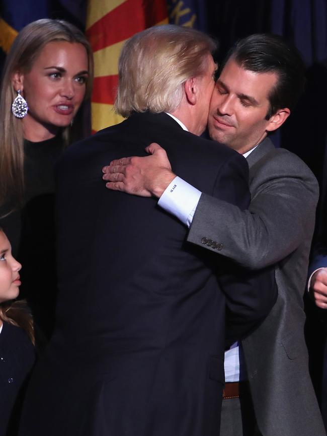 Trump and his son Donald Trump Jr. embrace after the president elect delivered his acceptance speech at the New York Hilton. Picture: Getty Images