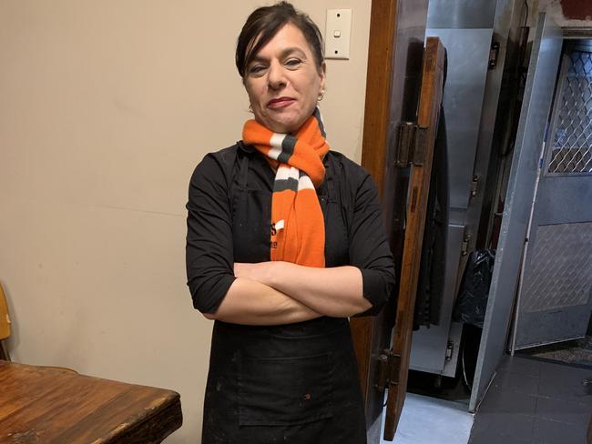 Lifelong employee Rosie wearing the GWS scarf.