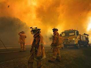 Firefighters on the scene at an out of control bushfire at Peregian Beach, where hundreds of residents were evacuated yet again. Photo Lachie Millard. Picture: Lachie Millard