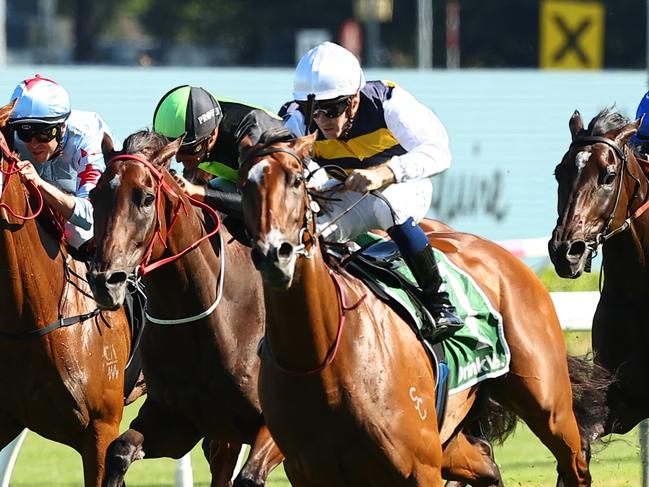 SYDNEY, AUSTRALIA - MARCH 09: Tyler Schiller riding Lady Laguna wins Race 7 James Squire Canterbury Stakes during "The Agency Randwick Guineas Day" -  Sydney Racing at Royal Randwick Racecourse on March 09, 2024 in Sydney, Australia. (Photo by Jeremy Ng/Getty Images)