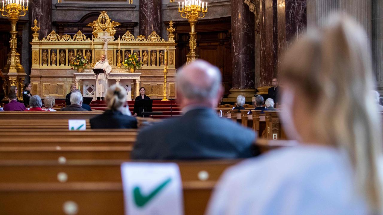 The congregation at the Berliner Dom cathedral observing social distancing. Picture: Odd Andersen/AFP