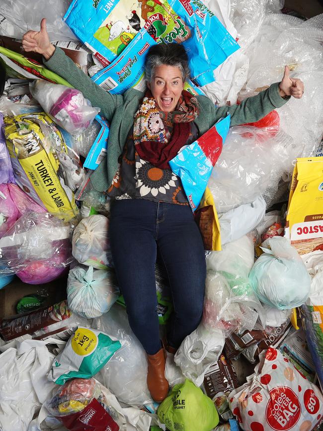 Surf Coast Mayor Liz Pattison gets in amongst recycling-bound soft plastics at Anglesea. Picture: Alan Barber