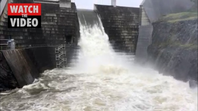 Hinze Dam overflows, waterfalls form on Mt Coolum