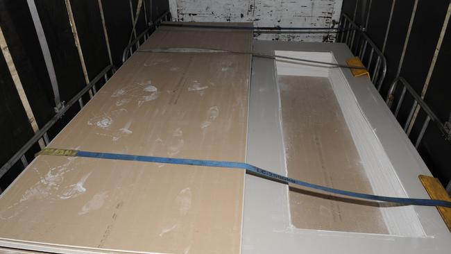 Australian Federal Police allege that smuggled cocaine was to be transported into a false floor in a trailer at Rocky War Memorial Park at Tolga. Picture: AFP.