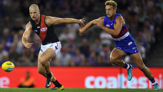 Former Dog Jake Stringer in action for Essendon.