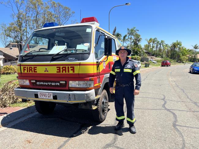 Dale McVeigh from the Queensland Fire and Rescue Service in the area on Thursday as firies checked on damage to homes. Picture: Keith Woods.