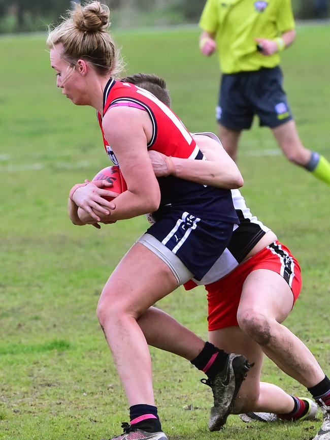 Darebin's Lauren Arnell is tackled against St Kilda Sharks on Sunday. Picture: Carmelo Bazzano