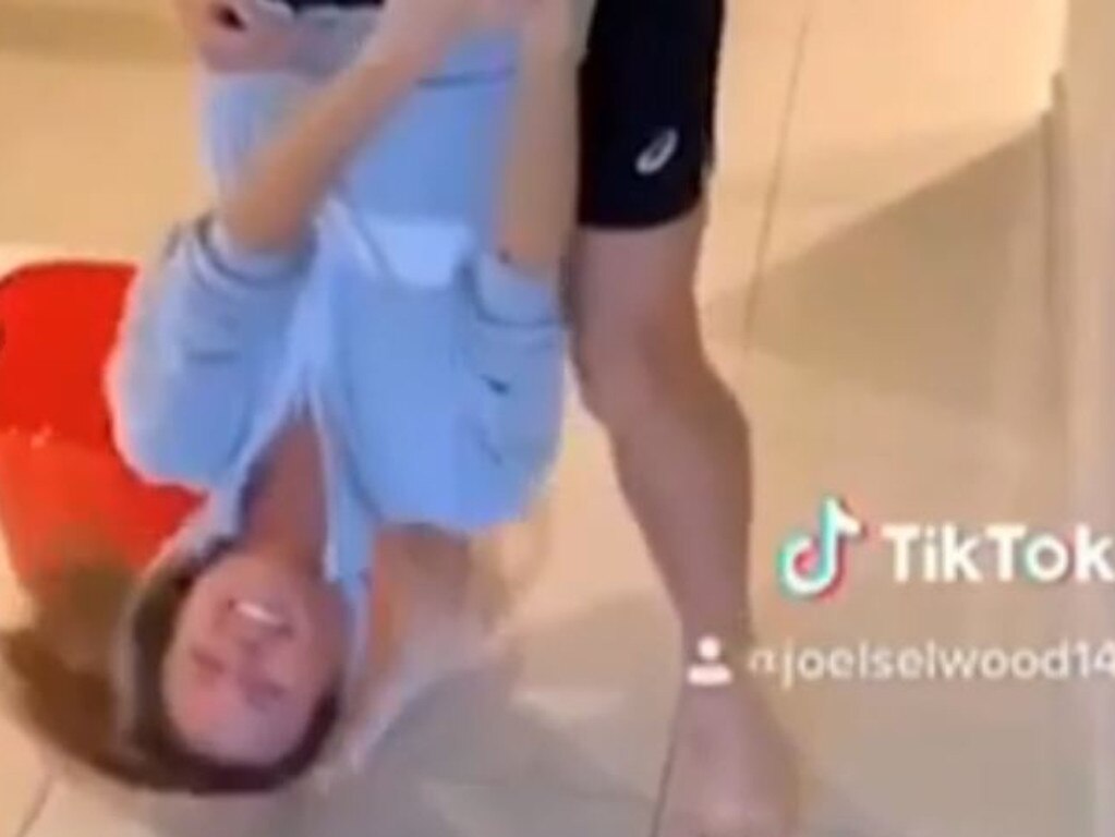 Joel Selwood using wife Brit as a mop during a Tiktok clip