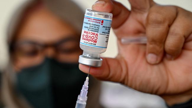 A health worker prepares a dose of the Moderna Covid-19 vaccine. Picture: AFP