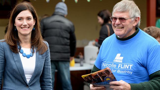 Liberal candidate Nicolle Flint with volunteer Ralph Walker.