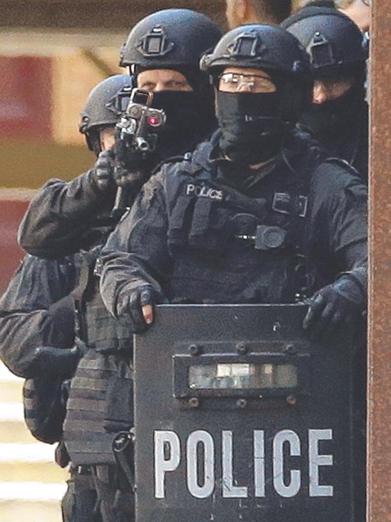 Specialised police, including Ben Besant, outside the Lindt Cafe. Picture: Mark Metcalfe/Getty Images