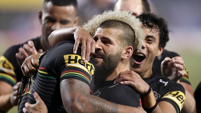 Viliame Kikau of the Panthers (left) celebrates with Josh Mansour after scoring a try to put the Panthers in front during the Round 6 NRL match between Penrith Panthers and Melbourne Storm at Campbelltown Stadium in Sydney, Friday, June 19, 2020. (AAP Image/Craig Golding) NO ARCHIVING, EDITORIAL USE ONLY