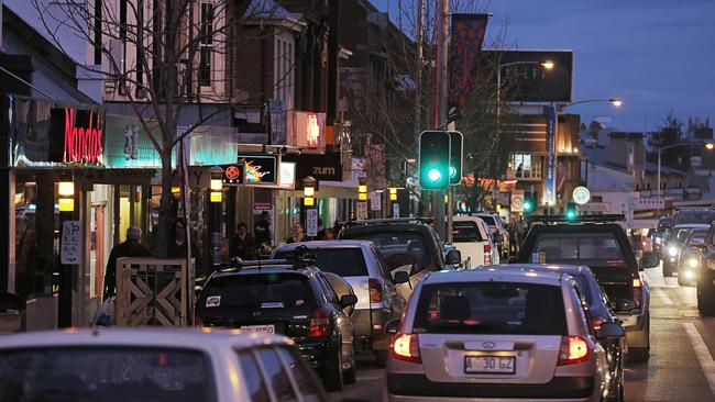 North Hobart's restaurant strip is apparently choked with Uber Eats drivers ramping—occupying parking spaces until they get an order to collect.Picture: MATHEW FARRELL