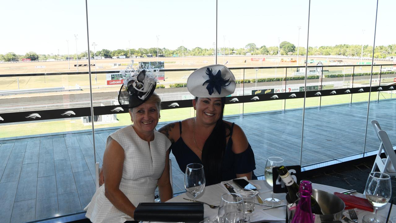 Sandy Enniss and Tiani Rykers at the Darwin Turf Club Bridge Toyota Ladies' Day / Derby Day. Picture: KATRINA BRIDGEFORD